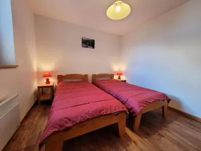 Un ou plusieurs lits dans un hébergement de l'établissement Résidence Les Balcons Des Curtious - 3 Pièces pour 6 Personnes MAE-2283