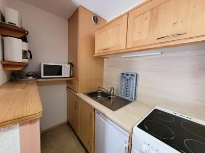 Cuisine ou kitchenette dans l'établissement Résidence Belle - 2 Pièces pour 4 Personnes MAE-2353