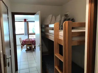 Un ou plusieurs lits dans un hébergement de l'établissement Résidence Les Balcons Des Curtious - Studio pour 4 Personnes MAE-2363