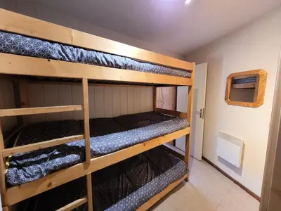 Un ou plusieurs lits dans un hébergement de l'établissement Résidence Les Pres Du Bois - Studio pour 4 Personnes MAE-2373