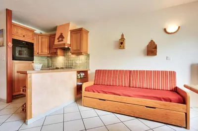 Cuisine ou kitchenette dans l'établissement Résidence Les Balcons Des Curtious - Appartement 4 pièces - 8 personnes MAE-2393