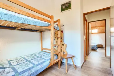 Un ou plusieurs lits dans un hébergement de l'établissement Résidence Les Balcons Des Curtious - Appartement 4 pièces - 8 personnes MAE-2393