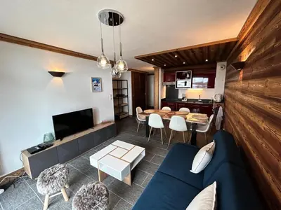 Coin salon dans l'établissement Résidence La Bergerie - Appartement 2 pièces chaleureux et bien équipé MAE-2433