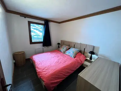 Un ou plusieurs lits dans un hébergement de l'établissement Résidence La Bergerie - Appartement 2 pièces chaleureux et bien équipé MAE-2433