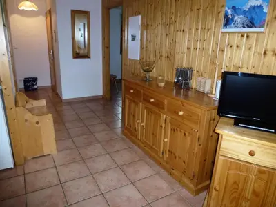 Télévision ou salle de divertissement dans l'établissement Résidence Les Balcons Des Curtious - 3 Pièces pour 6 Personnes MAE-2463