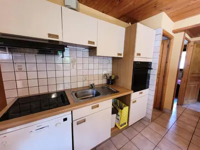 Cuisine ou kitchenette dans l'établissement Résidence La Buffaz - 3 Pièces pour 6 Personnes MAE-2483