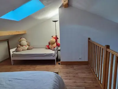 Un ou plusieurs lits dans un hébergement de l'établissement Résidence Lanslevillard Quartier Eglise - Le Flocon des Bois MAE-2503