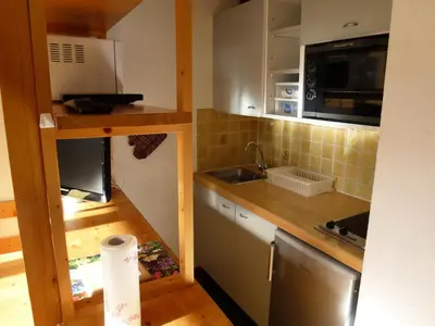 Cuisine ou kitchenette dans l'établissement Résidence Les Pres Du Bois - Studio pour 4 Personnes MAE-2543