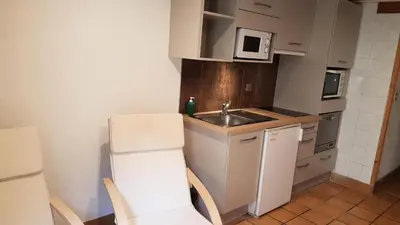 Cuisine ou kitchenette dans l'établissement Résidence Andagne - Appartement 2 personnes avec chambre indépendante MAE-2633