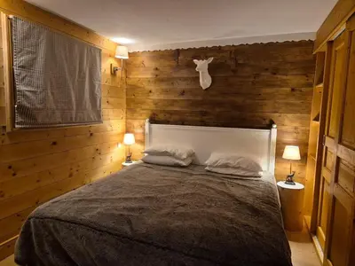 Un ou plusieurs lits dans un hébergement de l'établissement Splendide chalet 10pers, Sainte Foy Station