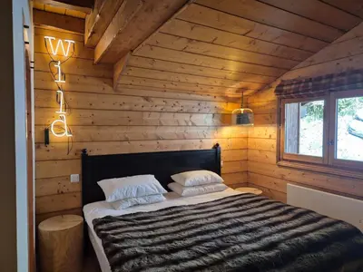 Un ou plusieurs lits dans un hébergement de l'établissement Splendide chalet 10pers, Sainte Foy Station