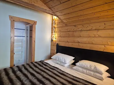 Un ou plusieurs lits dans un hébergement de l'établissement Splendide chalet 10pers, Sainte Foy Station