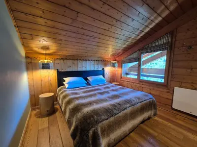 Un ou plusieurs lits dans un hébergement de l'établissement Splendide chalet 10pers, Sainte Foy Station