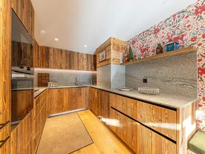 Cuisine ou kitchenette dans l'établissement Appartement de luxe avec piscine et sauna, 8 couchages à Val-d'Isère - FR-1-694-437