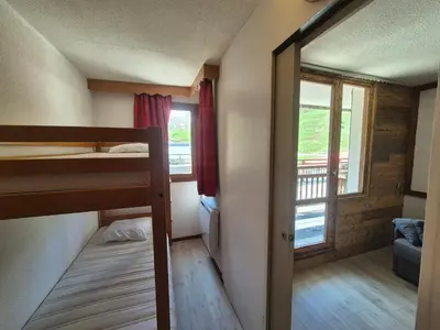 Un ou plusieurs lits dans un hébergement de l'établissement Studio ski aux pieds Tignes Val Claret - 4 pers, balcon - FR-1-502-599