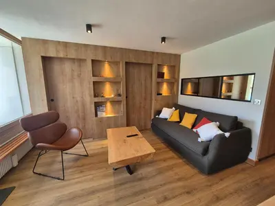 Coin salon dans l'établissement Appartement rénové à Tignes · Balcon · Wifi inclus - FR-1-502-601