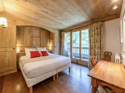 Un ou plusieurs lits dans un hébergement de l'établissement Duplex élégant, 8 pers., cheminée, Val-d'Isère, parking, WiFi - FR-1-694-440