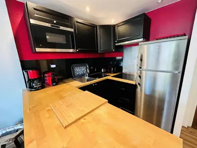 Cuisine ou kitchenette dans l'établissement Résidence Supertignes - Appartement rénové · spacieux · grande terrasse MAE-3053