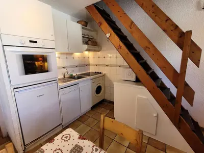 Cuisine ou kitchenette dans l'établissement Résidence Belle - 2 Pièces pour 6 Personnes MAE-2303