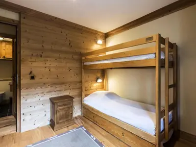 Un ou plusieurs lits dans un hébergement de l'établissement Résidence Aquila - Appartement confortable Proche des Pistes Parking couvert MAE-2943