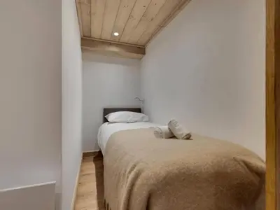Un ou plusieurs lits dans un hébergement de l'établissement Chalet De Bellevarde - Appartement duplex entièrement rénové très confortable MAE-2953