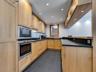 Cuisine ou kitchenette dans l'établissement Chalet De Bellevarde - Appartement duplex entièrement rénové très confortable MAE-2953