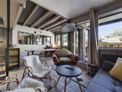 Coin salon dans l'établissement Résidence Val D'isere Village - Appartement rénové Ski aux pieds Balcon MAE-2973
