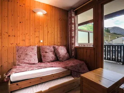 Coin salon dans l'établissement Résidence Val D'isere Village - Appartement confortable Ski aux pieds Parking couvert MAE-2993