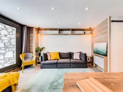 Coin salon dans l'établissement Résidence Val D'isere Village - Appartement entièrement rénové Aux pieds des pistes Parking couvert MAE-3083
