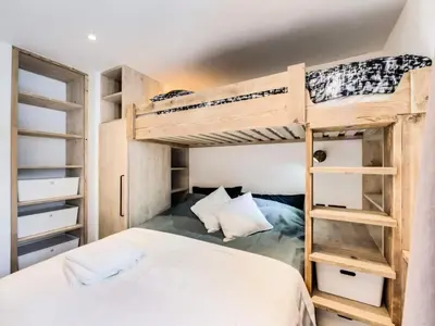 Un ou plusieurs lits dans un hébergement de l'établissement Résidence Val D'isere Village - Appartement entièrement rénové Aux pieds des pistes Parking couvert MAE-3083