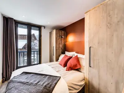 Un ou plusieurs lits dans un hébergement de l'établissement Résidence Val D'isere Village - Appartement entièrement rénové Aux pieds des pistes Parking couvert MAE-3083