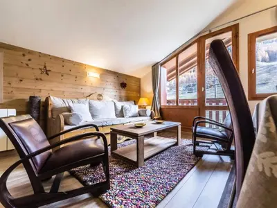 Coin salon dans l'établissement Résidence Rond Point Des Pistes - Appartement entièrement rénové Ski aux pieds Balcon MAE-3093