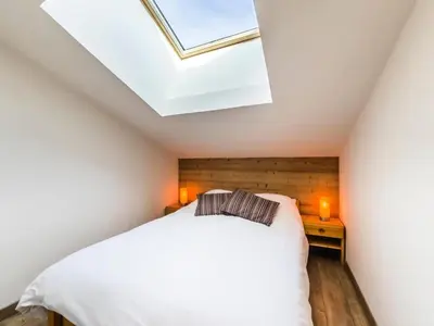 Un ou plusieurs lits dans un hébergement de l'établissement Résidence Rond Point Des Pistes - Appartement entièrement rénové Ski aux pieds Balcon MAE-3093