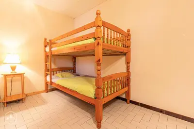 Un ou plusieurs lits dans un hébergement de l'établissement Résidence Arnaud Nicole - Appartement très spacieux au coeur du village MAE-0723