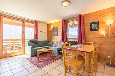 Coin salon dans l'établissement Résidence Les Flocons D'argent - Bel appartement en duplex avec jolie vue sur la montagne MAE-0773