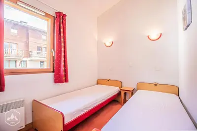 Un ou plusieurs lits dans un hébergement de l'établissement Résidence Les Flocons D'argent - Appartement confortable au pied des pistes. MAE-0813