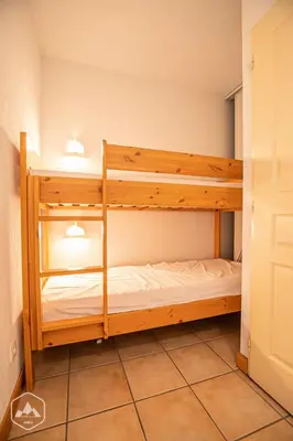 Un ou plusieurs lits dans un hébergement de l'établissement Résidence Les Flocons D'argent - Appartement confortable au pied des pistes. MAE-0813