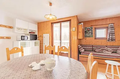 Cuisine ou kitchenette dans l'établissement Résidence Saint Sebastien - Appartement ambiance sur les toits avec vue dégagée sur les montagnes MAE-0833
