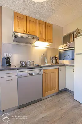 Cuisine ou kitchenette dans l'établissement Les Chalets De La Pyramide - CH1 - LES CHALETS DE LA PYRAMIDE MAE-0853