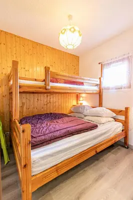 Un ou plusieurs lits dans un hébergement de l'établissement Résidence Genevray - Bel appartement avec vue dégagée sur les montagnes MAE-0883