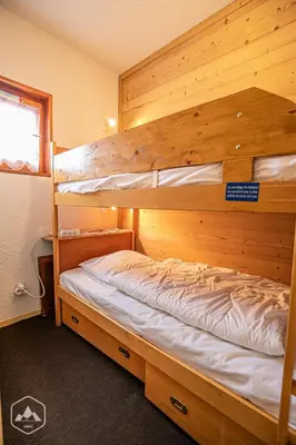 Un ou plusieurs lits dans un hébergement de l'établissement Résidence Saint Sebastien - Appartement fonctionnel avec terrasse ensoleillée. MAE-0923