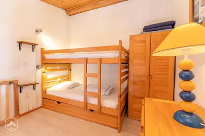 Un ou plusieurs lits dans un hébergement de l'établissement Résidence Setives - Appartement vintage-chic avec belle vue sur les montagnes. MAE-1023