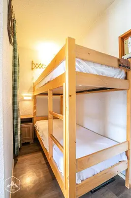 Un ou plusieurs lits dans un hébergement de l'établissement Résidence Saint Sebastien - Studio cocooning avec vue sur les montagnes MAE-1113