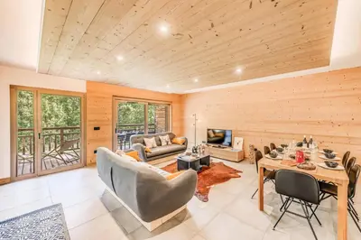 Coin salon dans l'établissement Résidence Les Terrasses De La Vanoise - 4 Pièces pour 8 Personnes MAE-4683