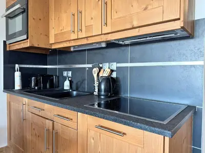 Cuisine ou kitchenette dans l'établissement Arpette Appartement 2/4 personnes au pied des pistes