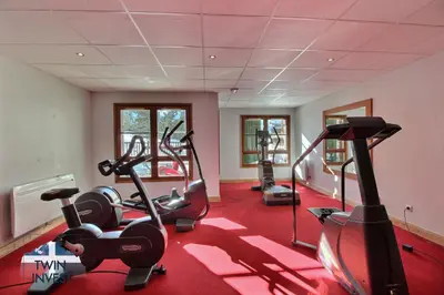 Salle ou équipements de sports de l'établissement ARC 1950 - Appartement 8 personnes Duplex Cheminée - ski aux pieds - Sauna, Hammam, Jacuzzi, Piscine