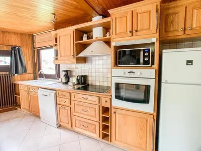 Cuisine ou kitchenette dans l'établissement Confortable Apt 8 Pers, Pieds des Pistes, Balcon, Animaux Bienvenus - FR-1-502-464