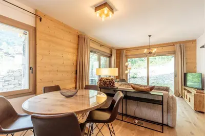 Coin salon dans l'établissement Tome, superbe appartement avec terrasse vue montagne