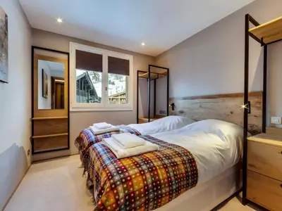 Un ou plusieurs lits dans un hébergement de l'établissement Résidence Solaise Plein Sud - Appartement duplex lumineux Proche des pistes et des commerces Hammam MAE-2853