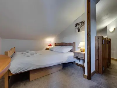 Un ou plusieurs lits dans un hébergement de l'établissement Résidence Rond Point Des Pistes - Appartement confortable Ski aux pieds Balcon MAE-2923
